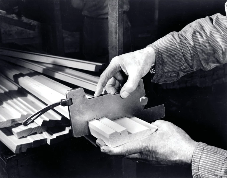 Worker Checking Frame Shape