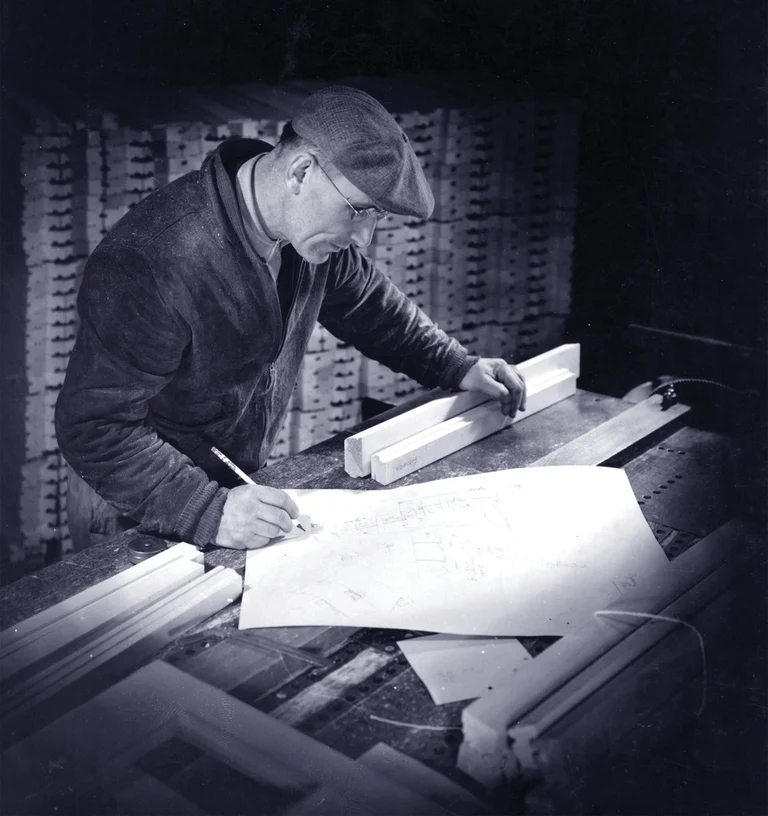 Worker Looking At Blueprint